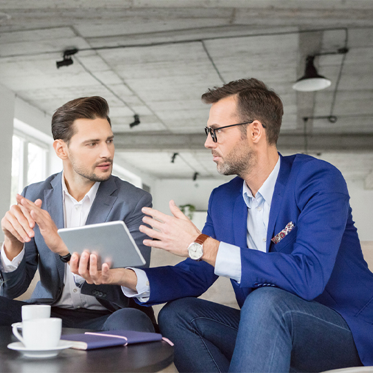 small group of colleagues having a discussion