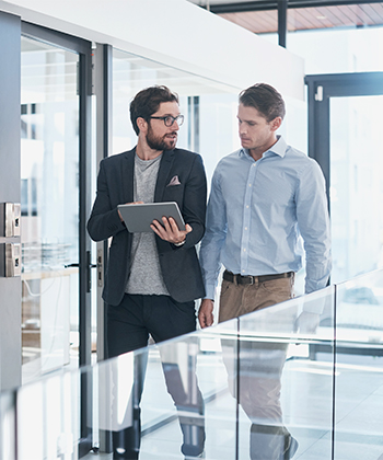 people talking with a tablet